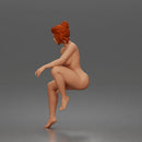 naked Woman Sitting Confidently