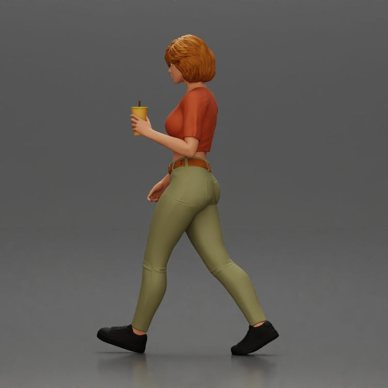 Woman strolls sipping beverage wearing crop top belted pants sneakers - Only-Games