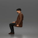 old man sitting calmly in a wheelchair, wearing a coat and a casual outfit