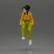 Sporty girl riding a red bike in bright yellow tracksuit - Only-Games