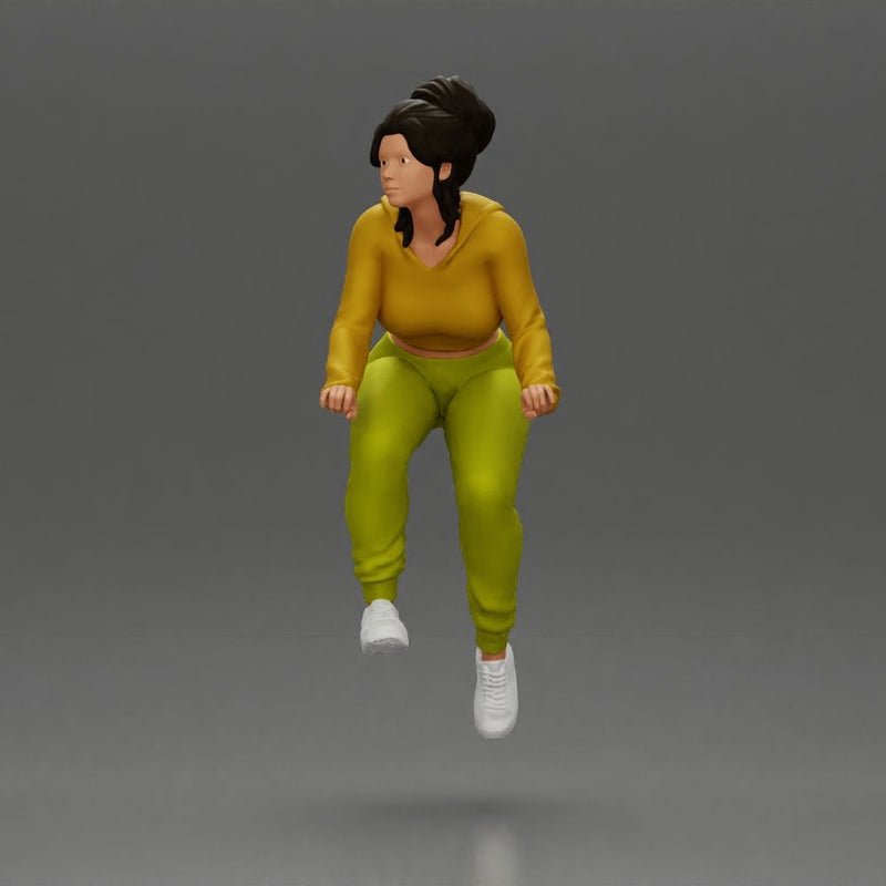 Sporty girl riding a red bike in bright yellow tracksuit - Only-Games