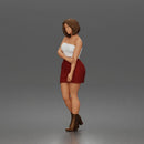 Elegant Woman Standing Gracefully Wearing Strapless Top Skirt And Boots