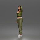 Skater woman holding skateboard wearing crop top baggy pants sneakers