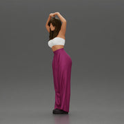 woman striking a heart-shaped pose with joyful energy - Only-Games