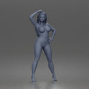 naked woman Standing touches hair bare skin legs bare feet