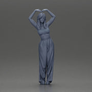 woman striking a heart-shaped pose with joyful energy - Only-Games