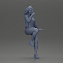 Confident woman sitting gracefully on a sleek modern sportbike - Only-Games