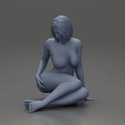 Naked Woman sitting gracefully on the floor with a relaxed pose - Only-Games