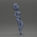 Naked woman posing confidently with voluminous hair - Only-Games