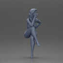 Naked woman sitting posing with a cigarette confidently - Only-Games