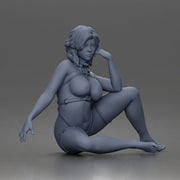 Thoughtful woman sits cross legged wearing strappy harness lingerie set - Only-Games