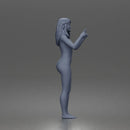 naked woman pointing upward