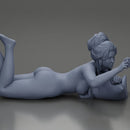 Relaxed Naked Woman Lying on Pillow Taking a Selfie with Phone - Only-Games