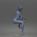 naked Woman Sitting Confidently