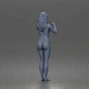 naked woman pointing upward