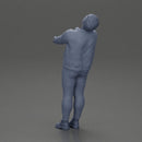 Man in jacket leaning back holding hands enjoying a playful dance moment - Only-Games