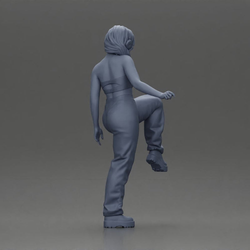 Woman in Headphones Lifting Leg - Only-Games
