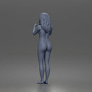 naked woman pointing upward