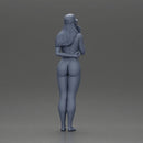 naked girl holding a phone on the beach and wearing a cap - Only-Games