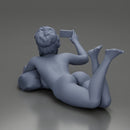 Relaxed Naked Woman Lying on Pillow Taking a Selfie with Phone - Only-Games