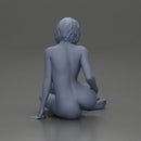 Naked Woman sitting gracefully on the floor with a relaxed pose - Only-Games