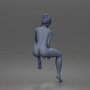 naked Woman Sitting Confidently