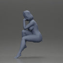 Naked Blonde Woman Sitting Gracefully - Only-Games