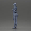 naked girl holding a phone on the beach and wearing a cap - Only-Games