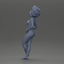 Naked woman posing confidently with voluminous hair - Only-Games