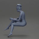 Naked Relaxed girl sipping coffee enjoying a peaceful moment on the beach - Only-Games