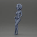 Naked woman posing confidently with voluminous hair - Only-Games