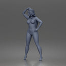 naked woman Standing touches hair bare skin legs bare feet