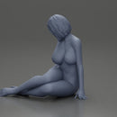 Naked Woman sitting gracefully on the floor with a relaxed pose - Only-Games