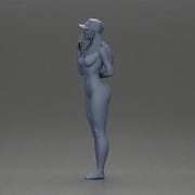 naked girl holding a phone on the beach and wearing a cap - Only-Games