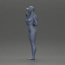 naked girl holding a phone on the beach and wearing a cap - Only-Games