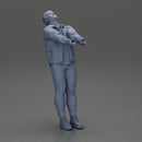 Man in jacket leaning back holding hands enjoying a playful dance moment - Only-Games