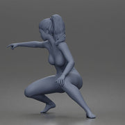 naked woman crouches aiming pistol - Only-Games