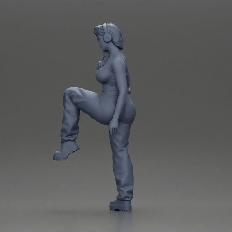 Woman in Headphones Lifting Leg - Only-Games