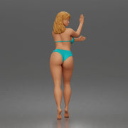 Surfer poses beside surfboard in bikini ready for waves 3 - Only-Games