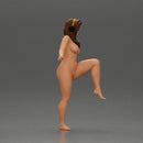 Naked Woman in Headphones Lifting Leg - Only-Games