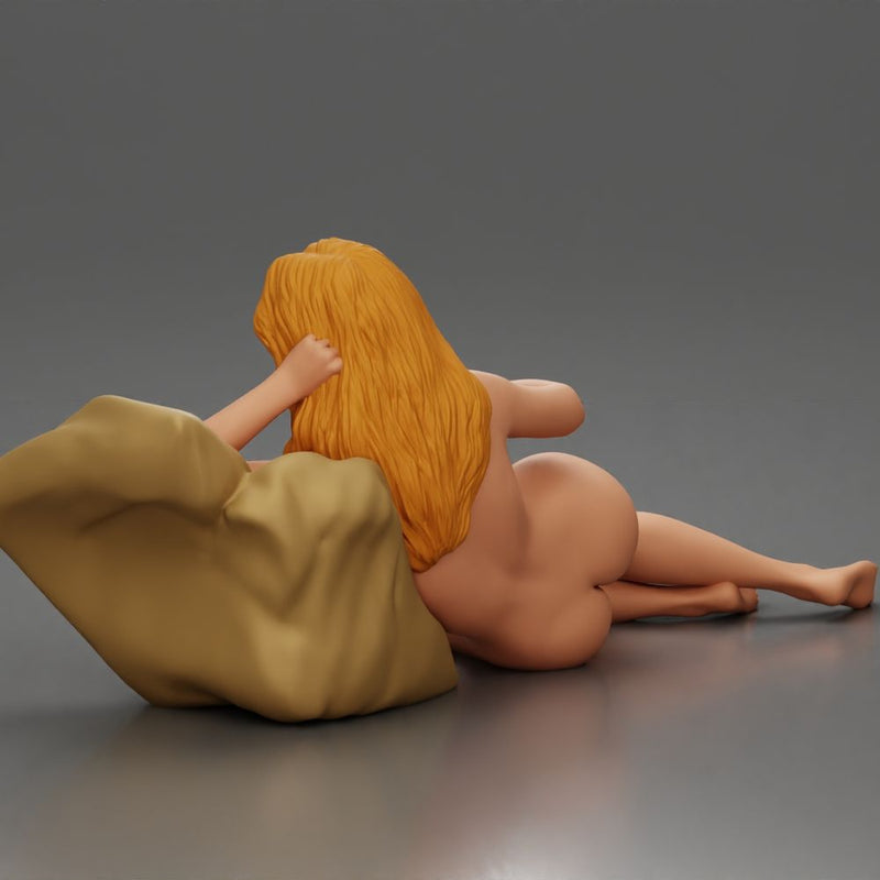 Naked Woman lounges atop pillow watching television holding remote - Only-Games