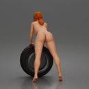 naked woman Pushing Tire