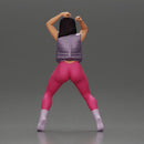 Bold Woman in Pink Jumpsuit Posing on a Sleek Motorcycle - Only-Games