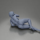 Woman in pink lingerie lying sideways resting arm with soft gaze - Only-Games