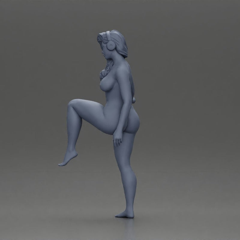 Naked Woman in Headphones Lifting Leg - Only-Games