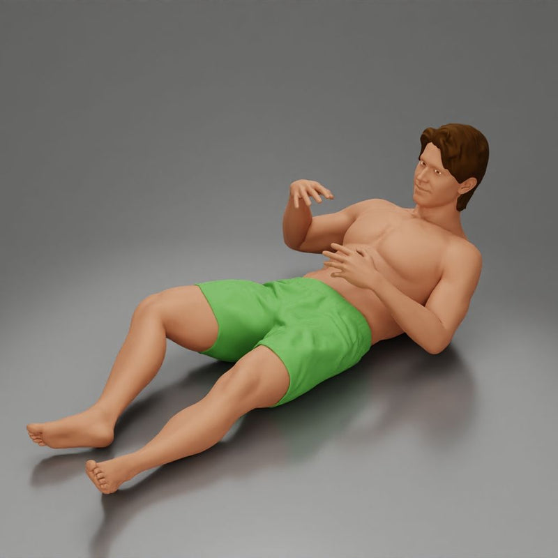 Man in green shorts reclining back raising hands with calm expression - Only-Games