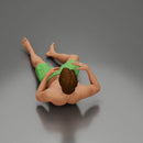 Man in green shorts reclining back raising hands with calm expression - Only-Games