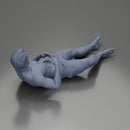 Man in green shorts reclining back raising hands with calm expression - Only-Games