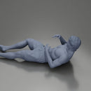 Man in green shorts reclining back raising hands with calm expression - Only-Games