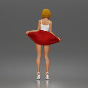 Cheerful girl twirling skirt playfully posing confidently in strappy heels - Only-Games